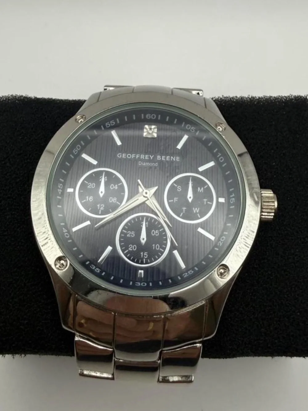 Geoffrey Beene Silver Stainless Steel Watch with Black Dial